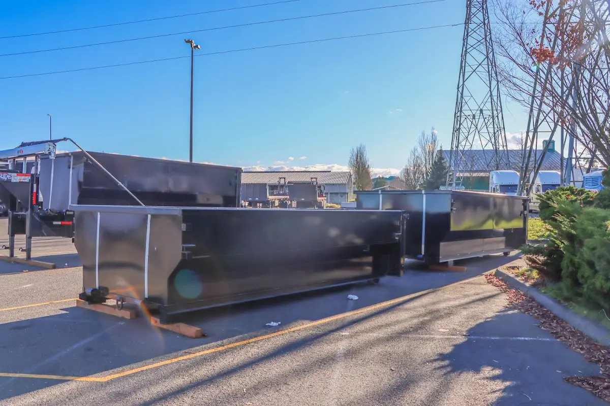 Roll-off dumpster ready for waste disposal at job site for Yard Waste Dumpster Rental in South Lebanon